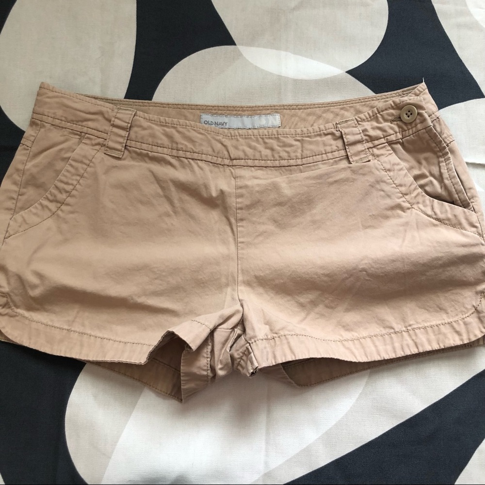 Old navy khaki shorts with side zipper on the right side.